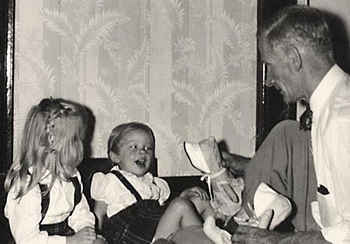 Betty And Laura Enjoy Louie Playing With Their Dolls