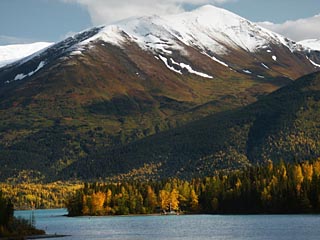 Snowy Peak Above The River Bend